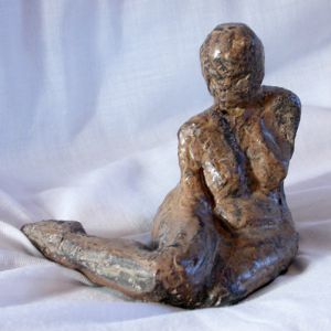 Sitzende Frau